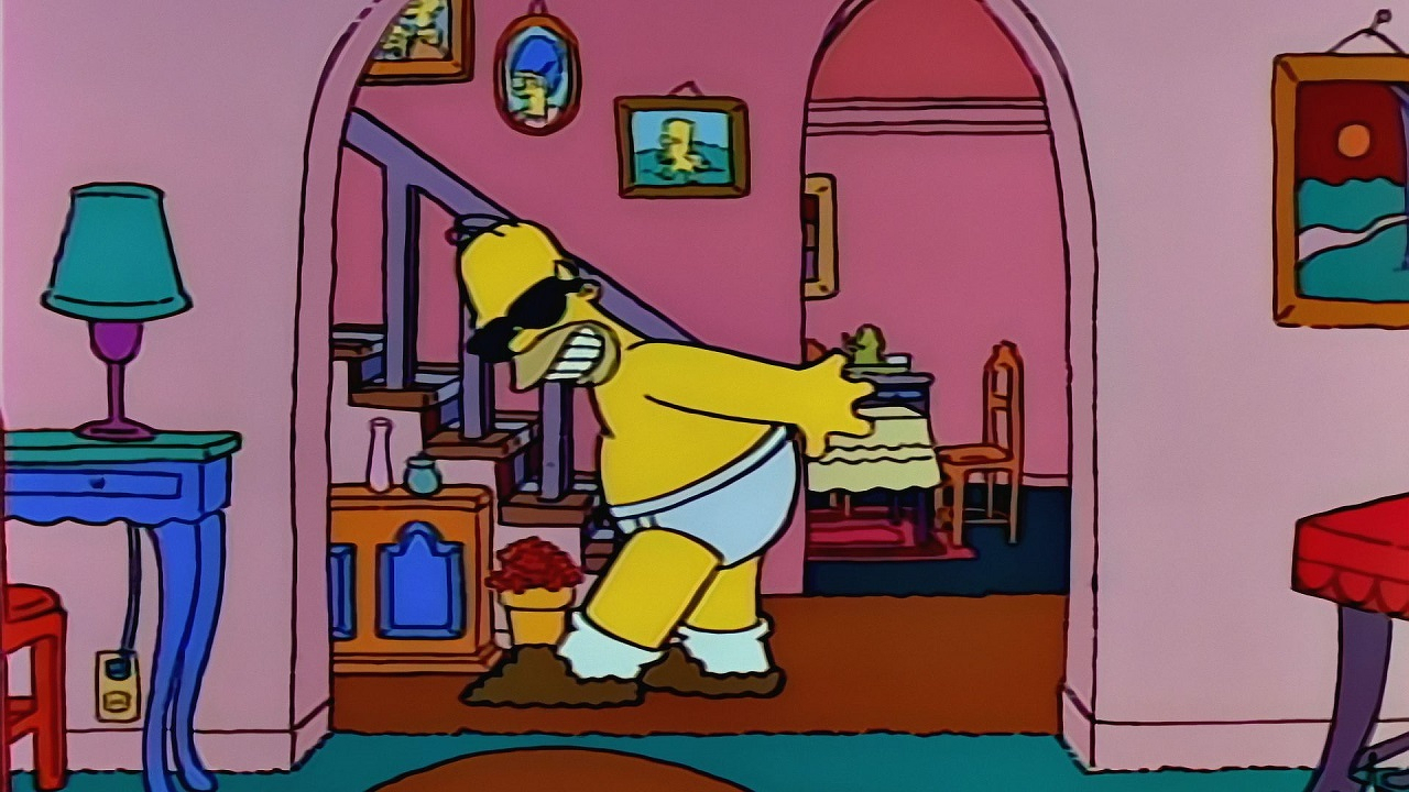 Auto-generated description: A cartoon character wearing sunglasses and undergarments strikes a playful pose in a colorful room.